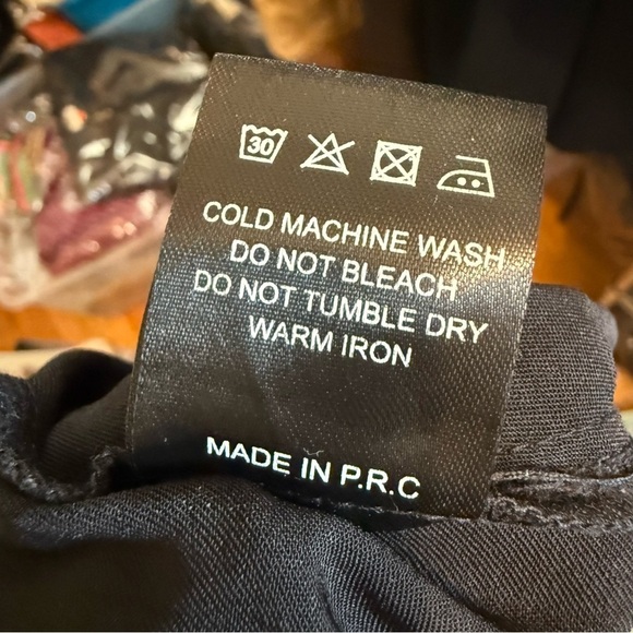 Black Asymmetrical Wrap Dress with Notched Collar - Picture 8 of 8